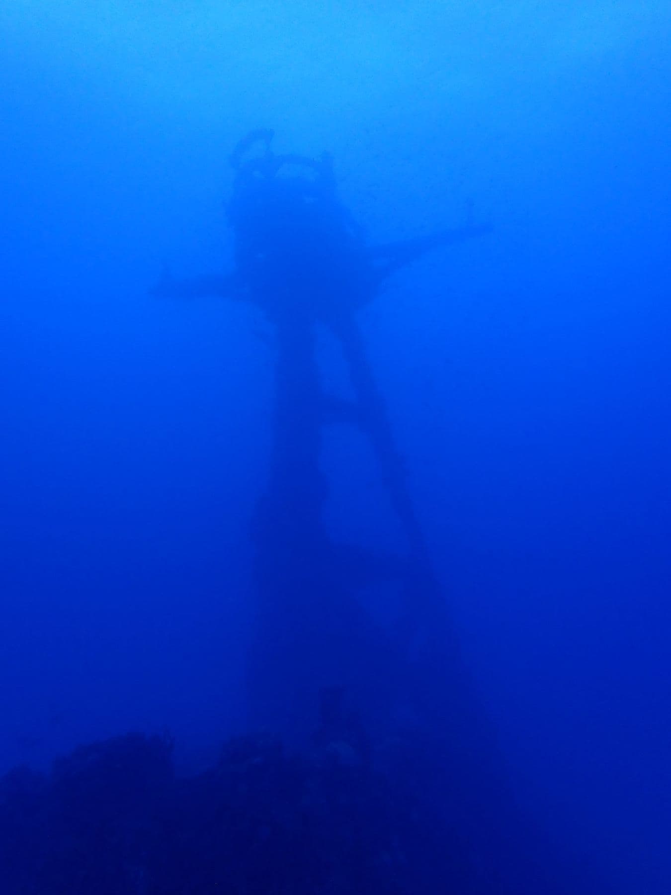 The mast fading into the blue