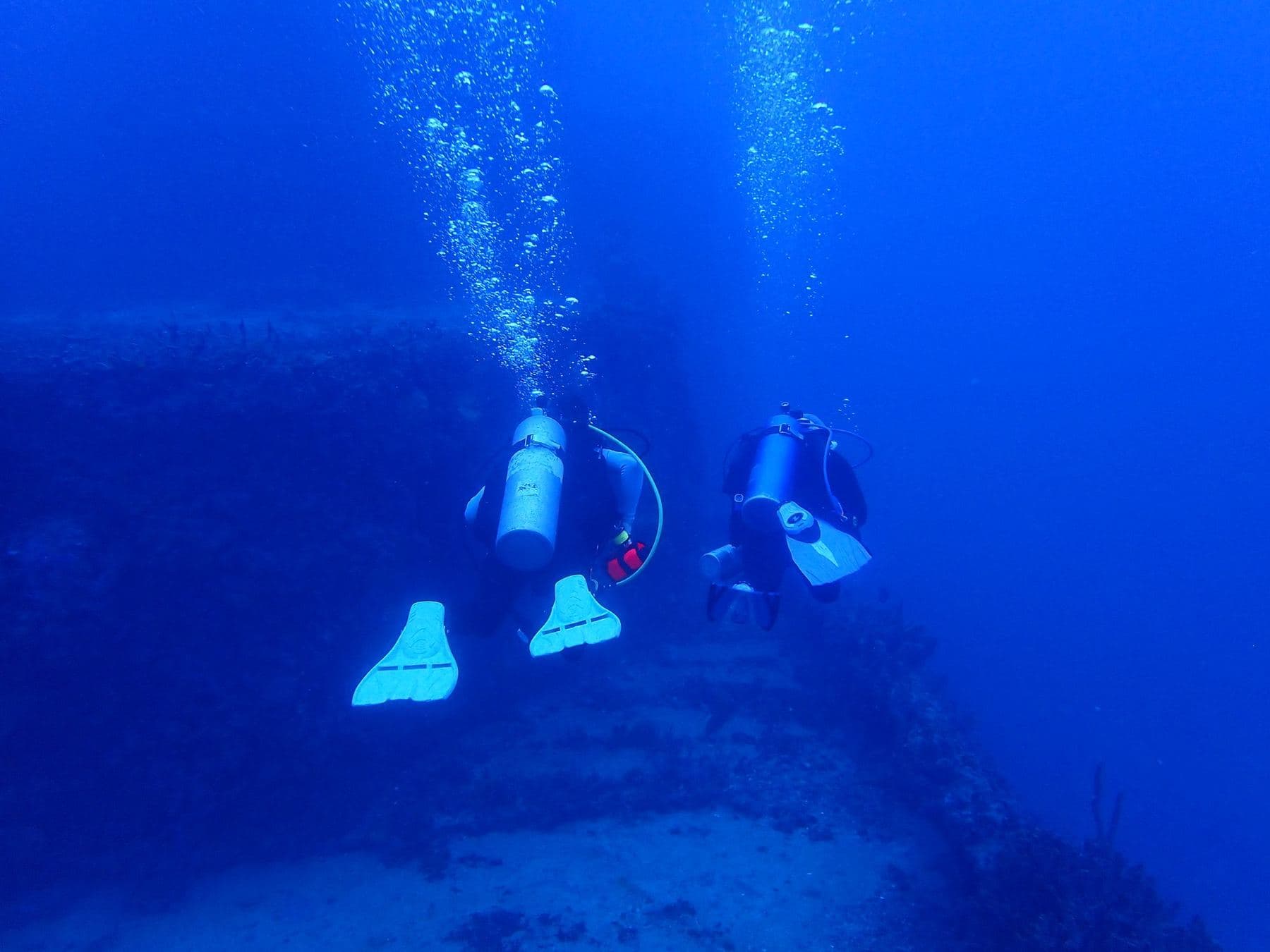 Two divers over the wreck