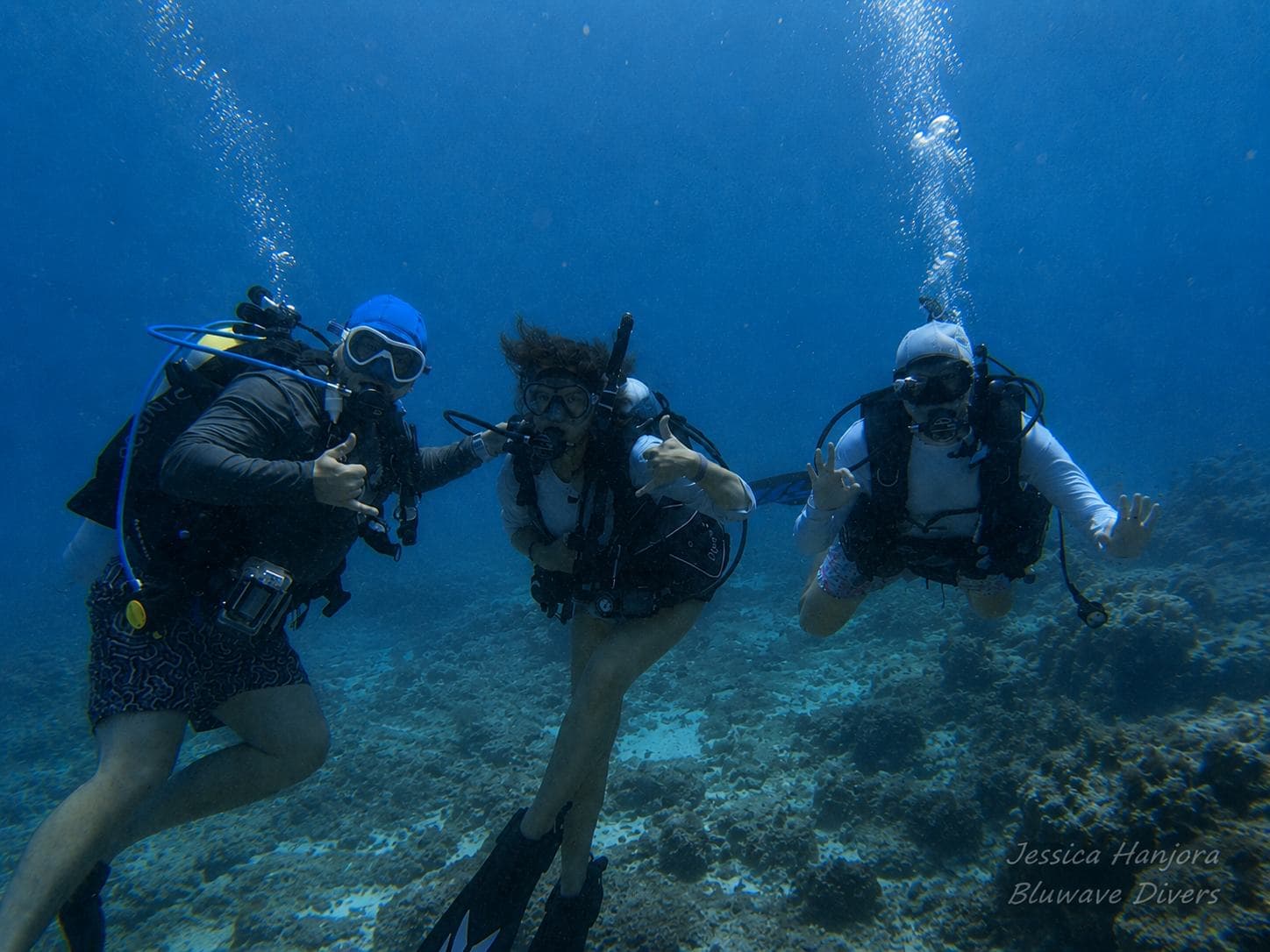 Three divers, three signals