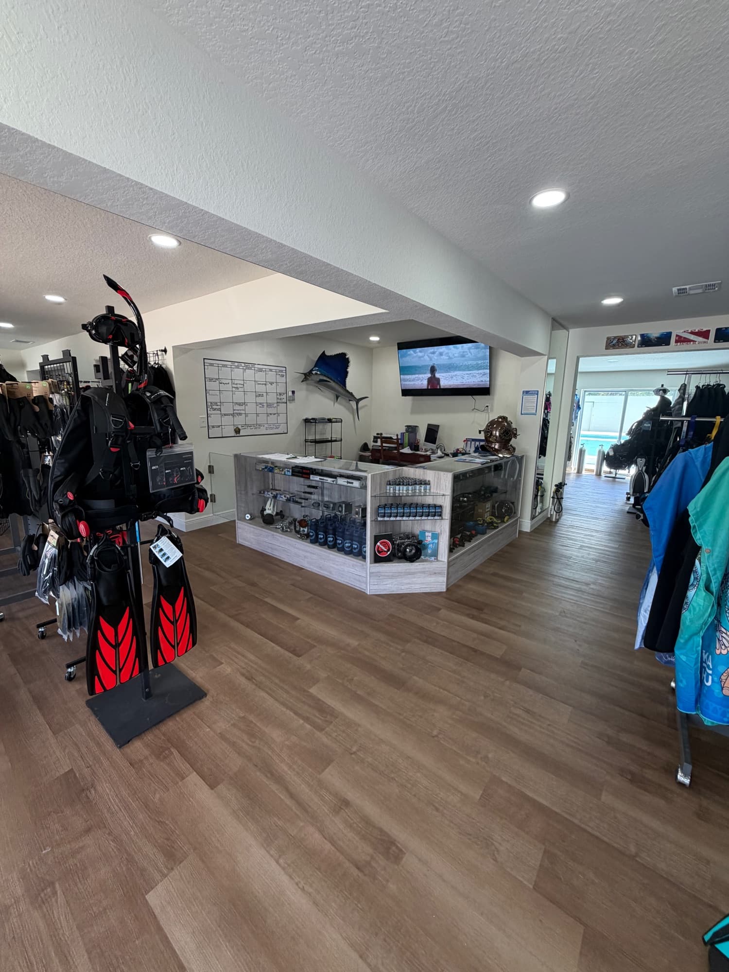 Oceanic and BARE wetsuits and BCDs on the retail floor at BluWave Divers, College Park Orlando